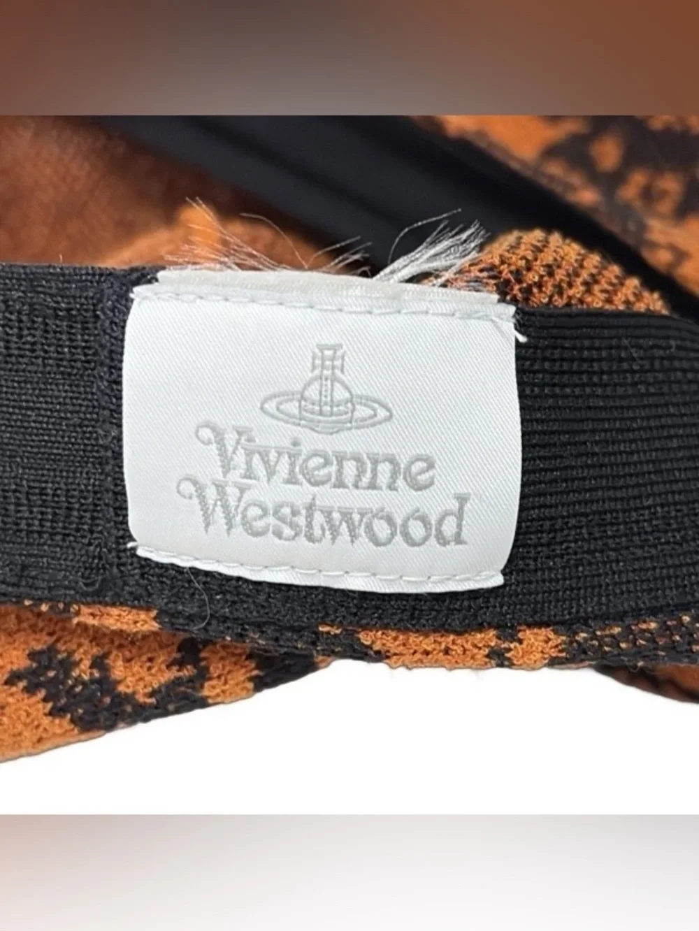 Vivienne Westwood y2k orange & black orb beret hat